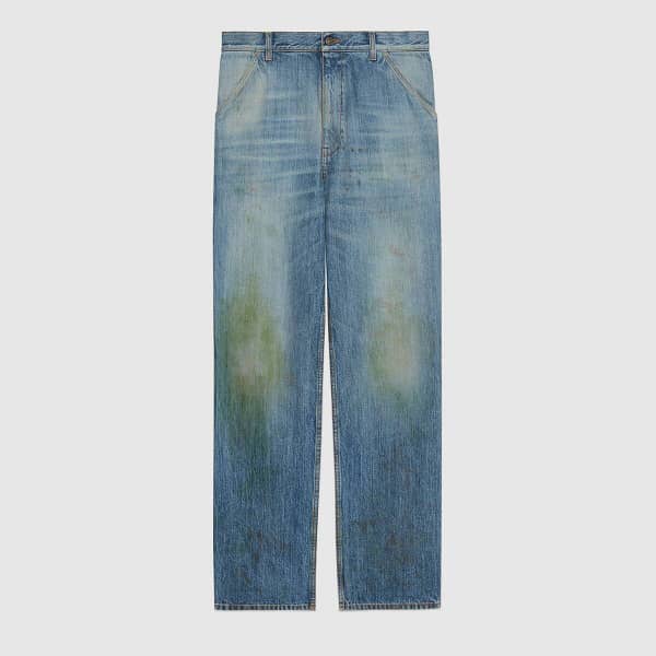 jeans macchiati d'erba di Gucci